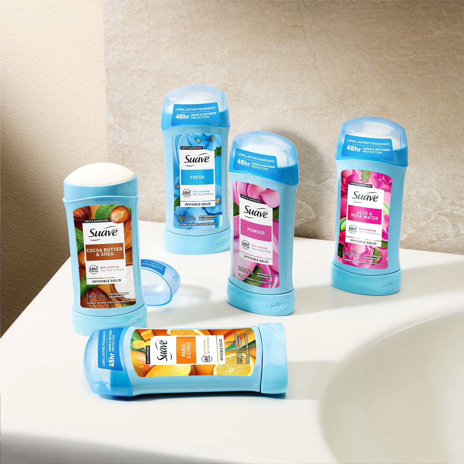 Suave sticks on a bathroom counter in lifestyle scene showing routine-ready convenience