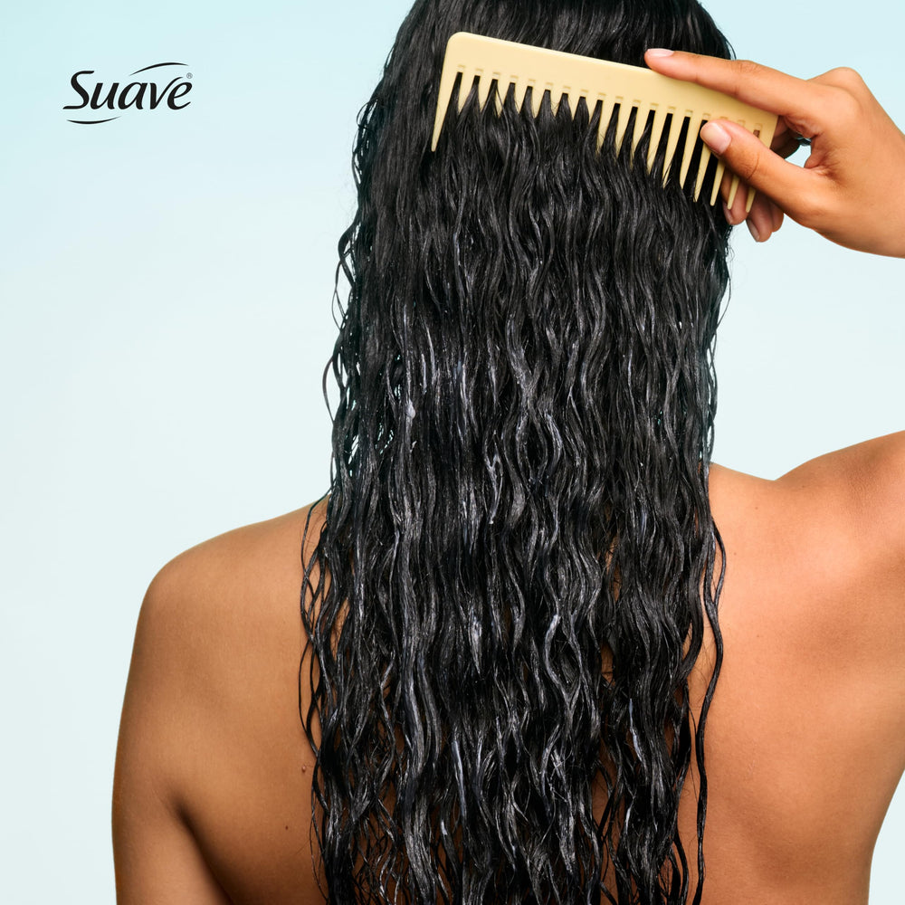Suave conditioner applied in shower showing detangling and smoothing benefit
