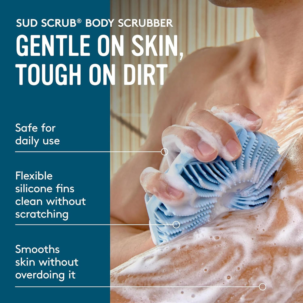 Sud Scrub held in hand with strap, demonstrates secure non-slip grip benefit
