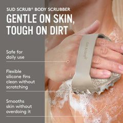 Sud Scrub in wet hand during shower, non-slip grip prevents dropping