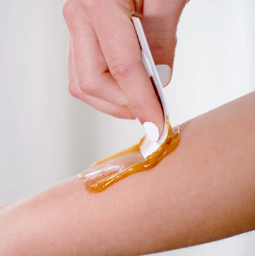 Bathroom counter scene with Sugar Me Smooth for at-home spa convenience benefit