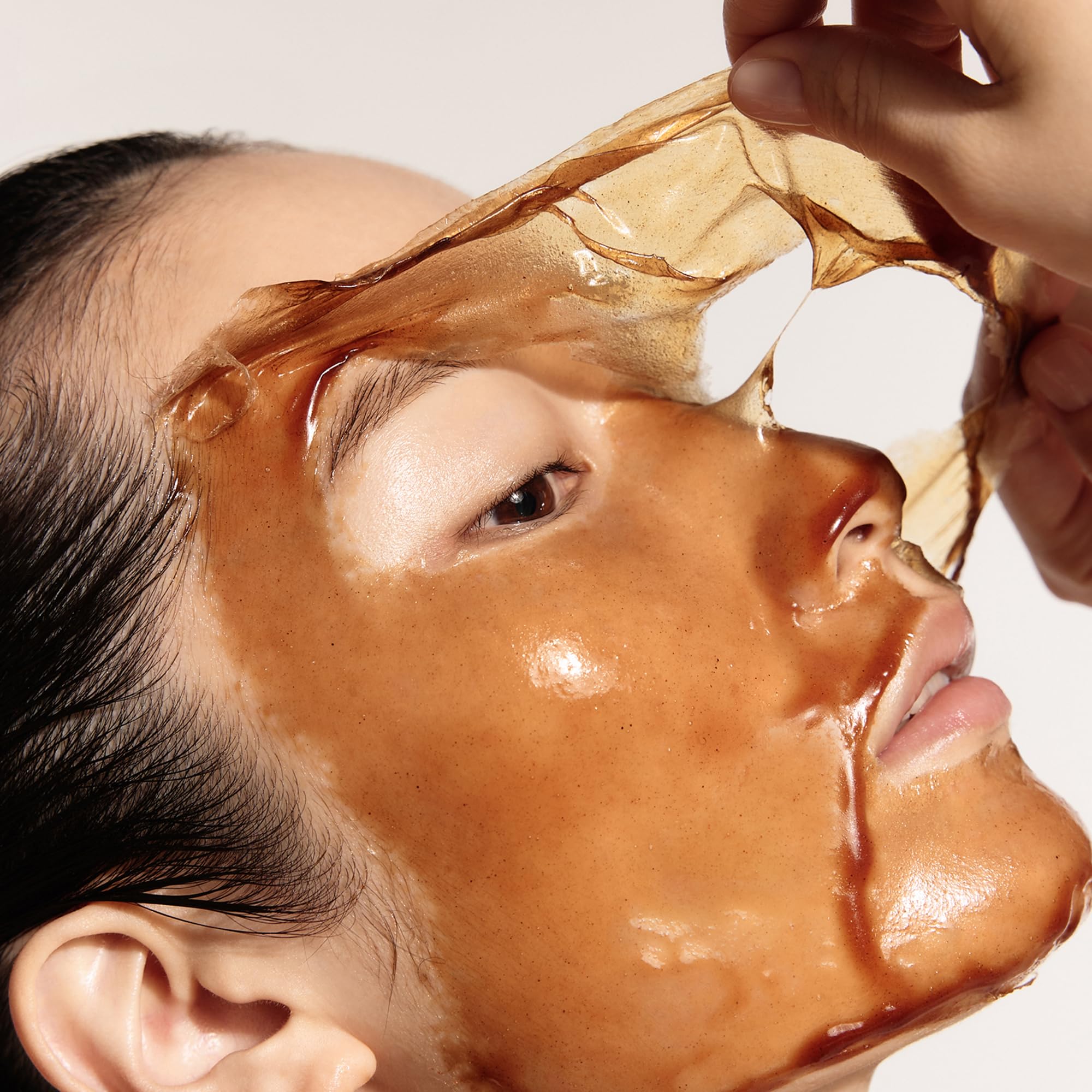 Sulwhasoo gently peeling mask from skin demonstrating removal of dead skin