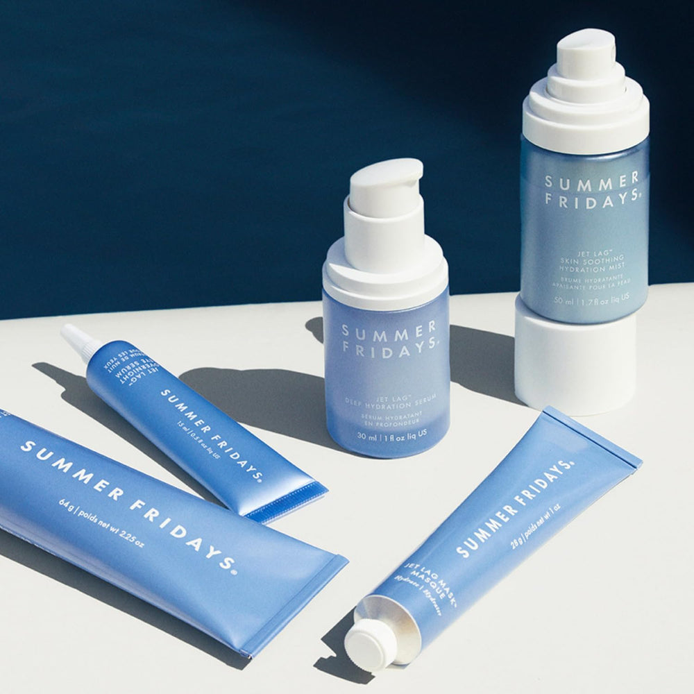 Summer Fridays lifestyle shot outdoors showing refreshing spritz during travel or commute