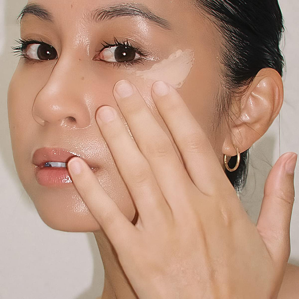 Summer Fridays lifestyle shot during morning routine showing glowing, hydrated eye area