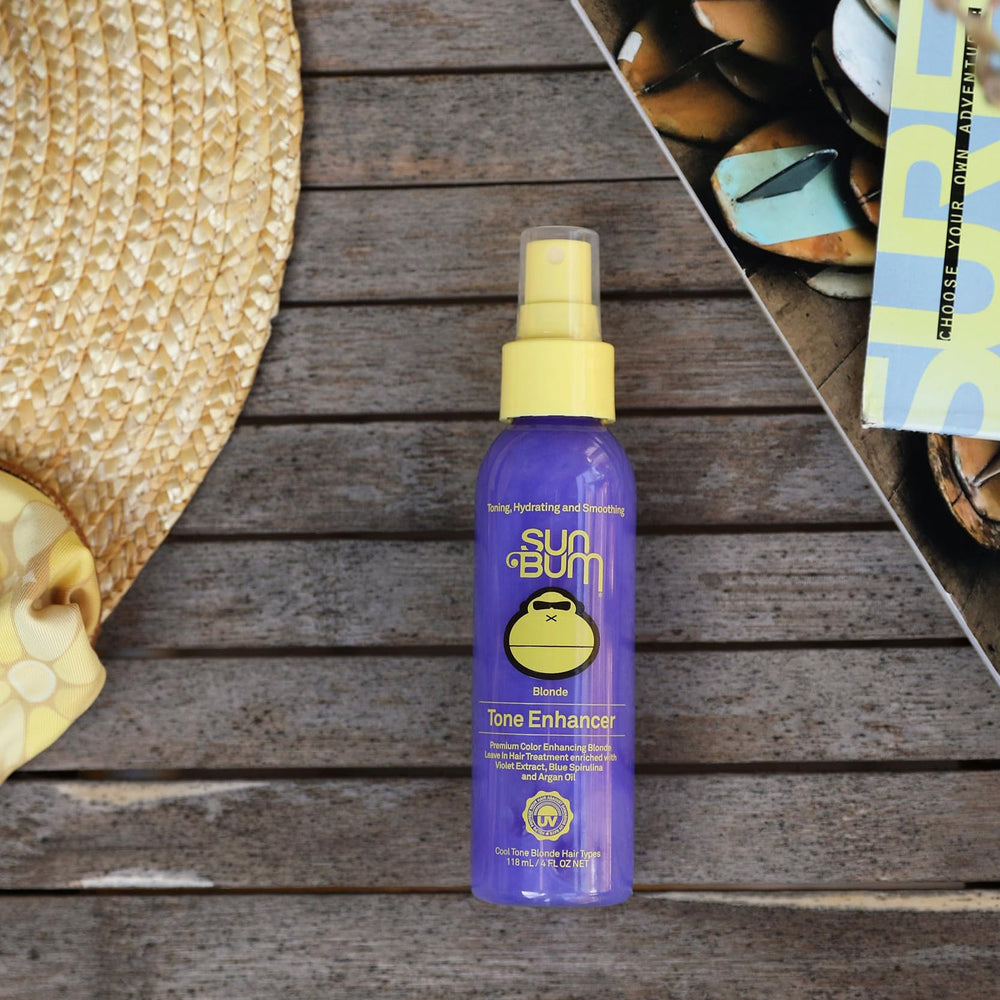 Sun Bum bottle with matching shampoo and conditioner showing extended tone maintenance benefit