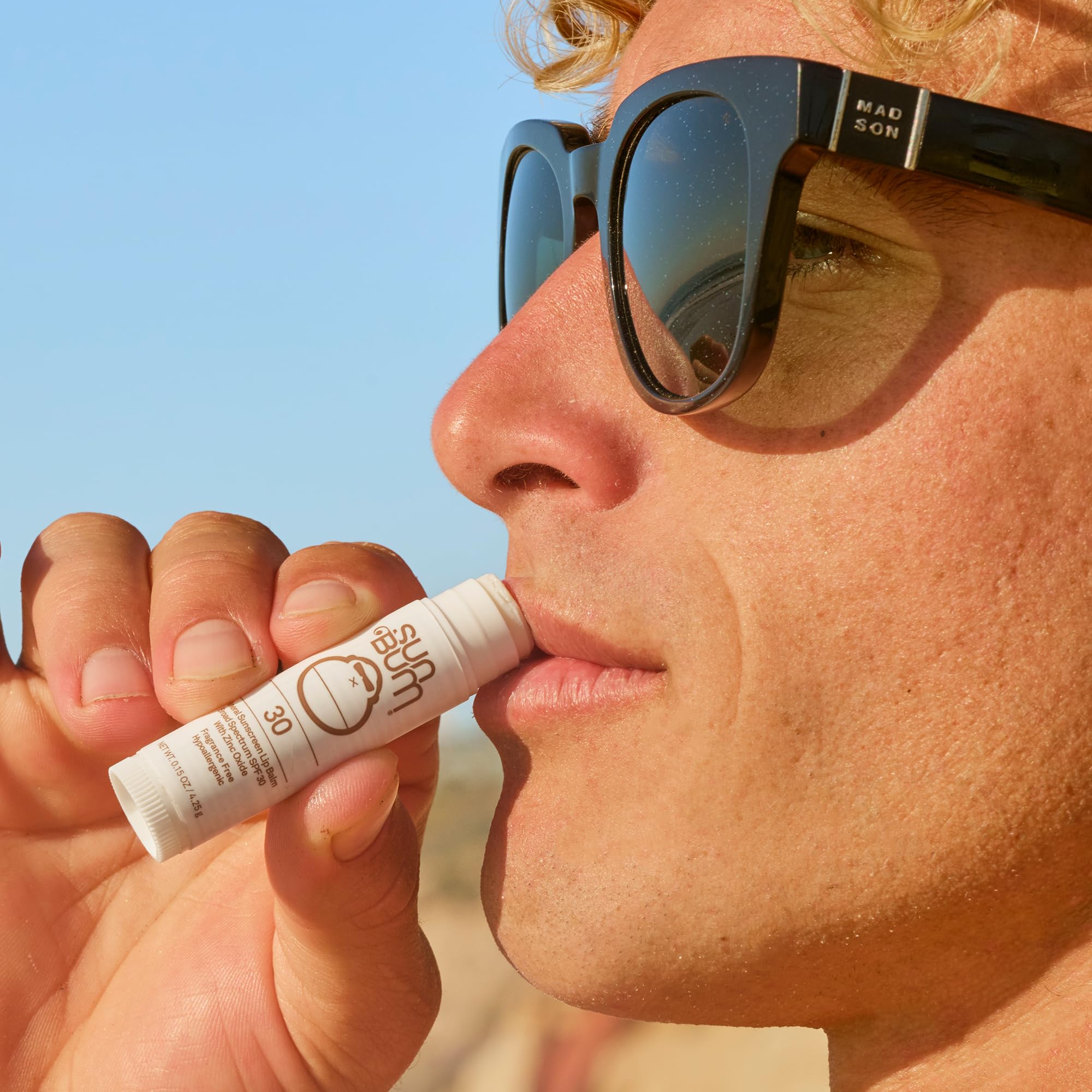 Sun Bum mineral lip balm twist-up view showing convenient on-the-go lip care benefit