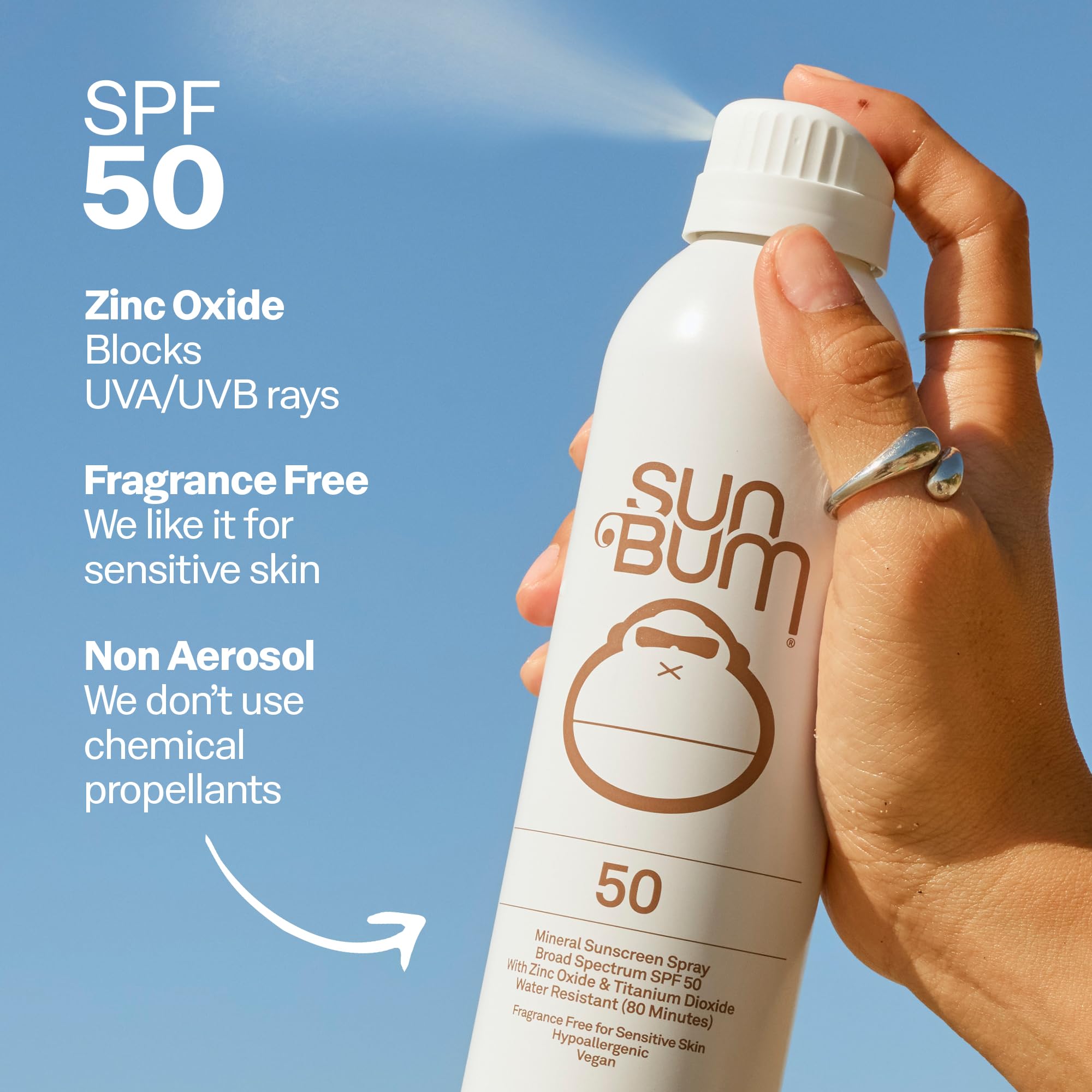 Sun Bum mineral spray on arm showing white cast for visible, reliable coverage