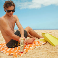 Sun Bum sunscreen texture on skin showing quick absorption benefit