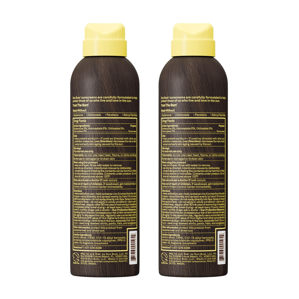 Sun Bum spray on skin with water splash illustrating water resistance