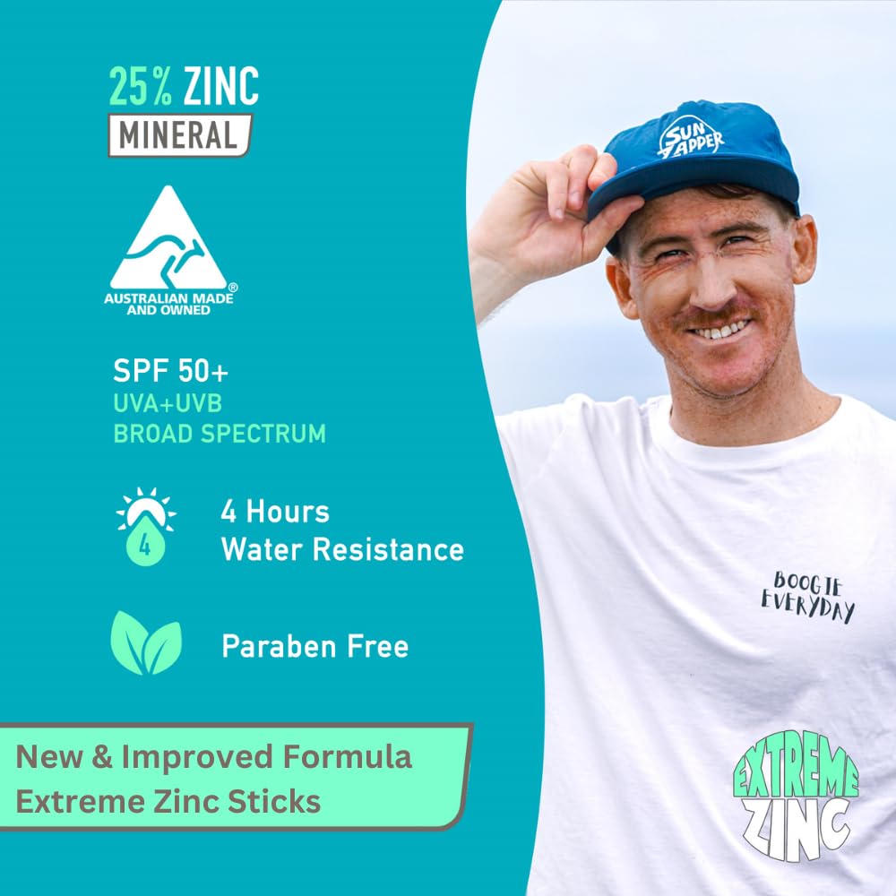 Athlete applying Sun Zapper on beach before paddling, showing outdoor protection