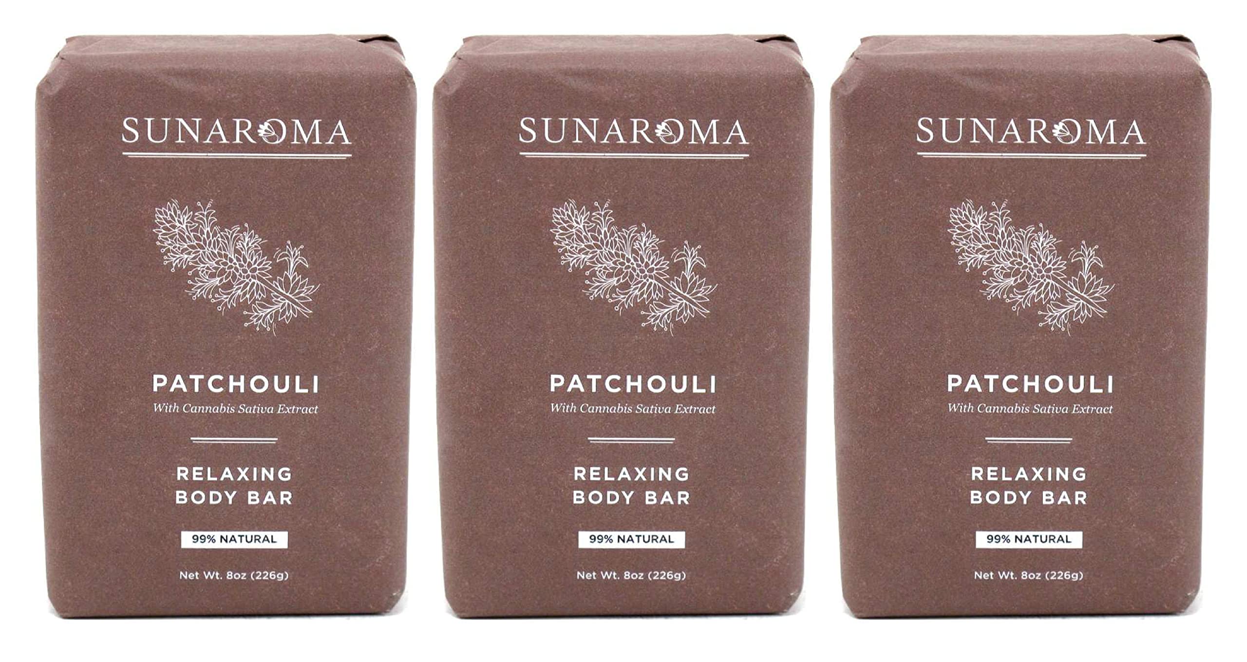 SUNAROMA patchouli bar next to ruler for scale showing generous 8-ounce size
