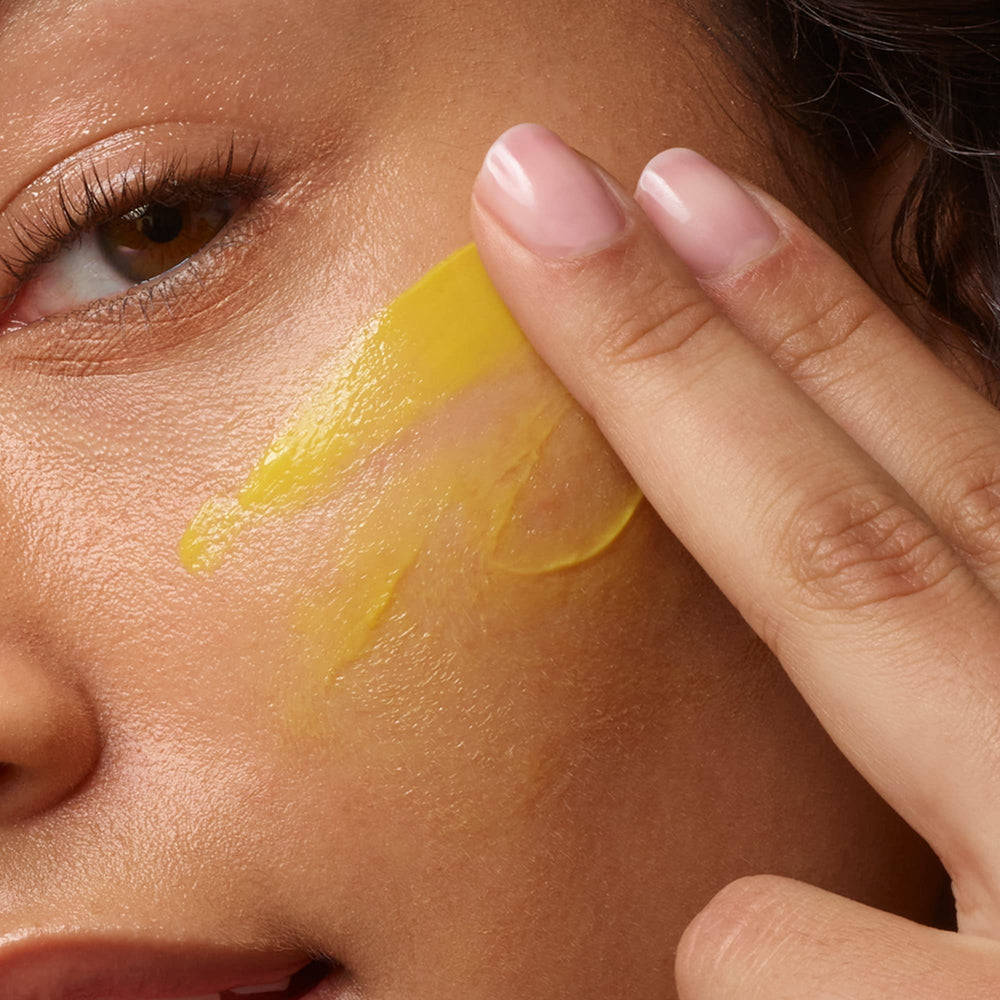 Sunday Riley C.E.O. Afterglow application on hand demonstrating non-greasy hydration