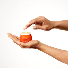 Sunday Riley cream being dispensed onto hand, shows easy application and quick absorption