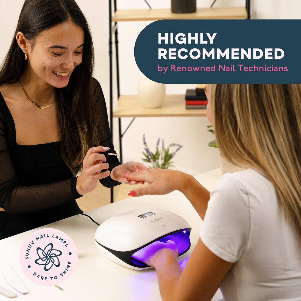 SUNUV SUN4 next to a hand to show scale and portability for travel use