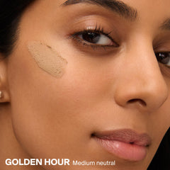 Supergoop! swatch on wrist showing Golden Hour tint and blending benefit