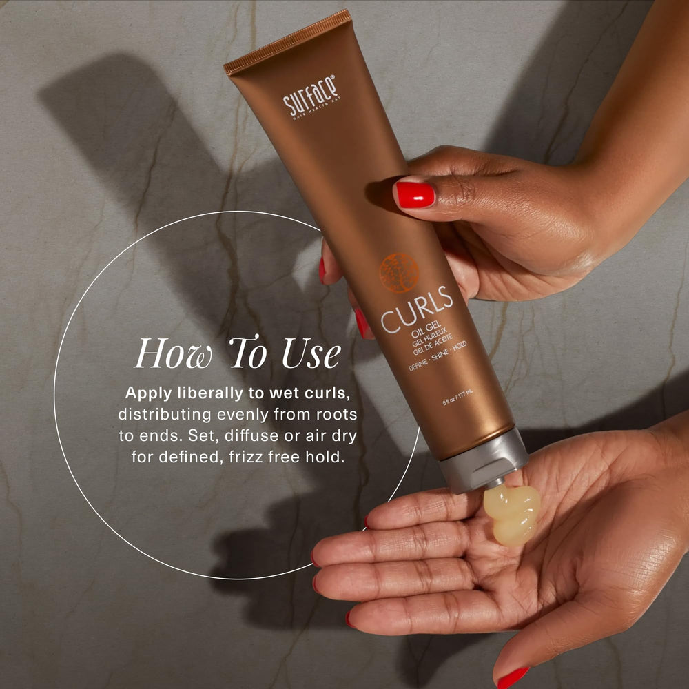 SURFACE applying gel to damp curly hair for even distribution and frizz control