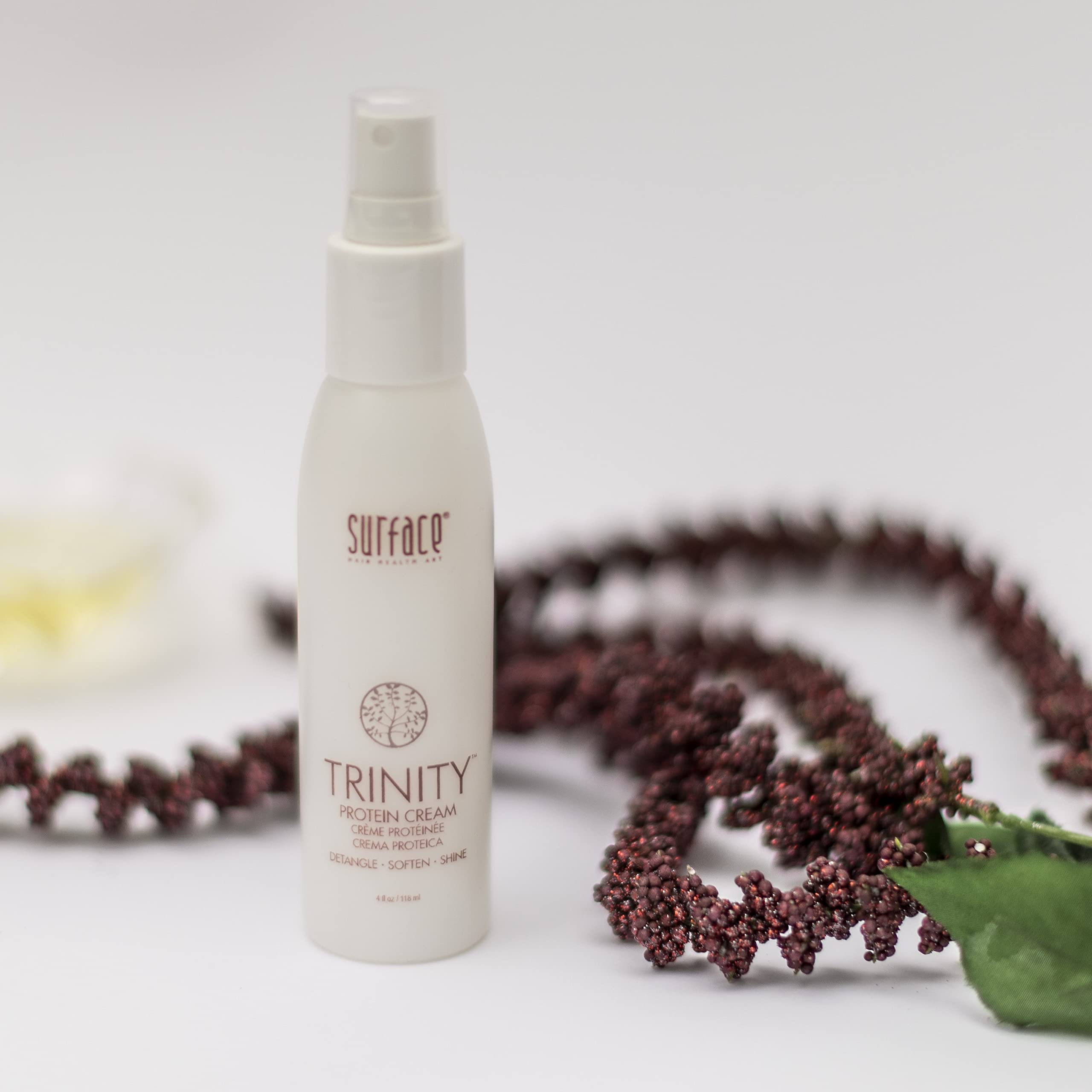 Surface application on damp hair demonstrating detangling and smoother strands