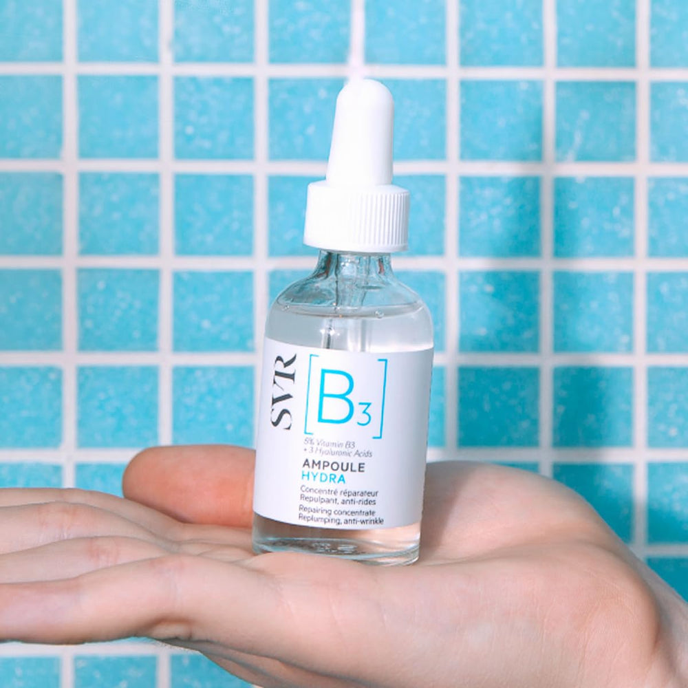 SVR B3 Repairing Concentrate on a bathroom counter staged in daily skincare routine