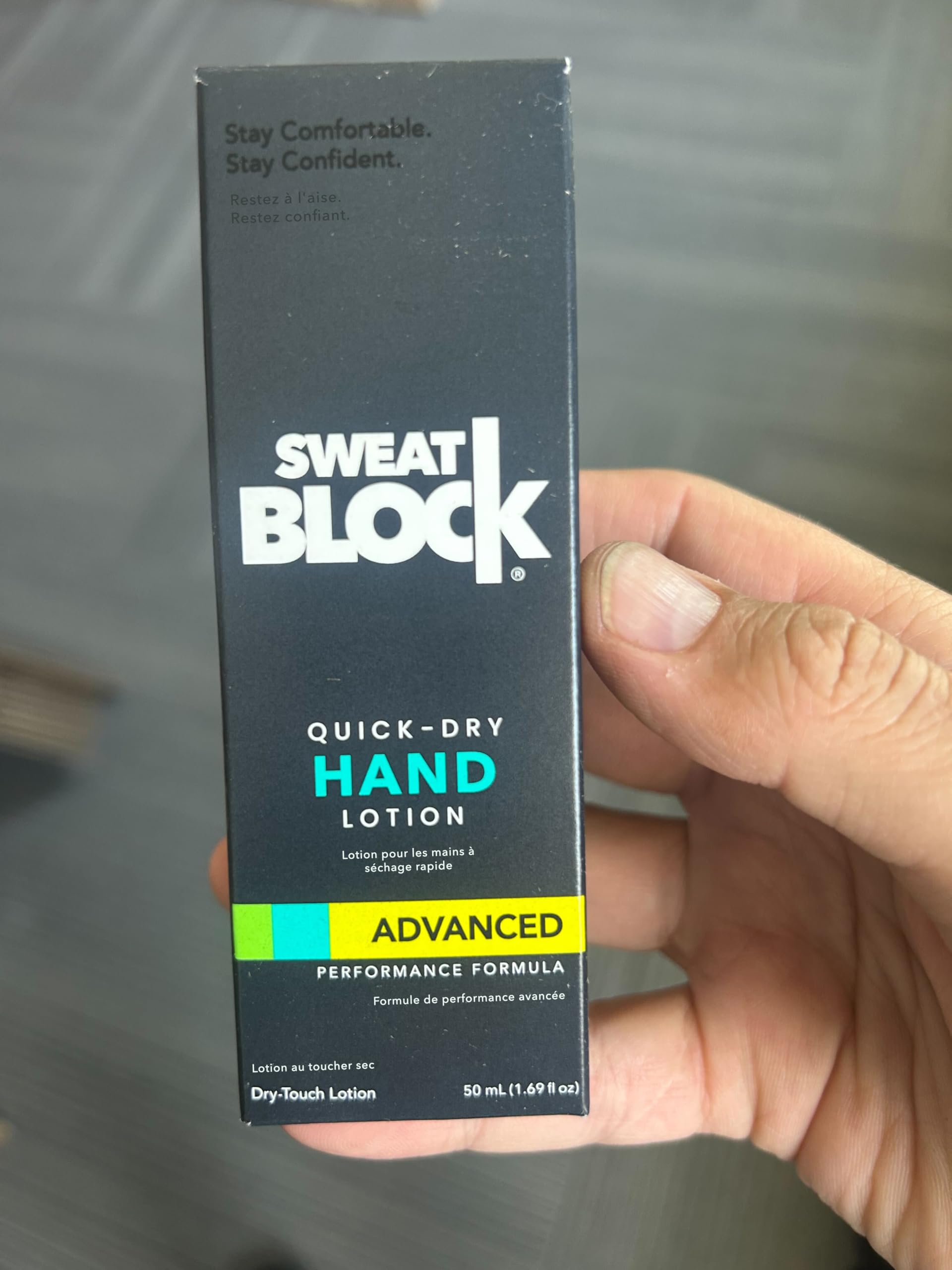 Gamer using controller with SweatBlock-treated hands for improved grip and control