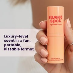 Sweetums applying to wrist showing discreet touchup and lasting scent