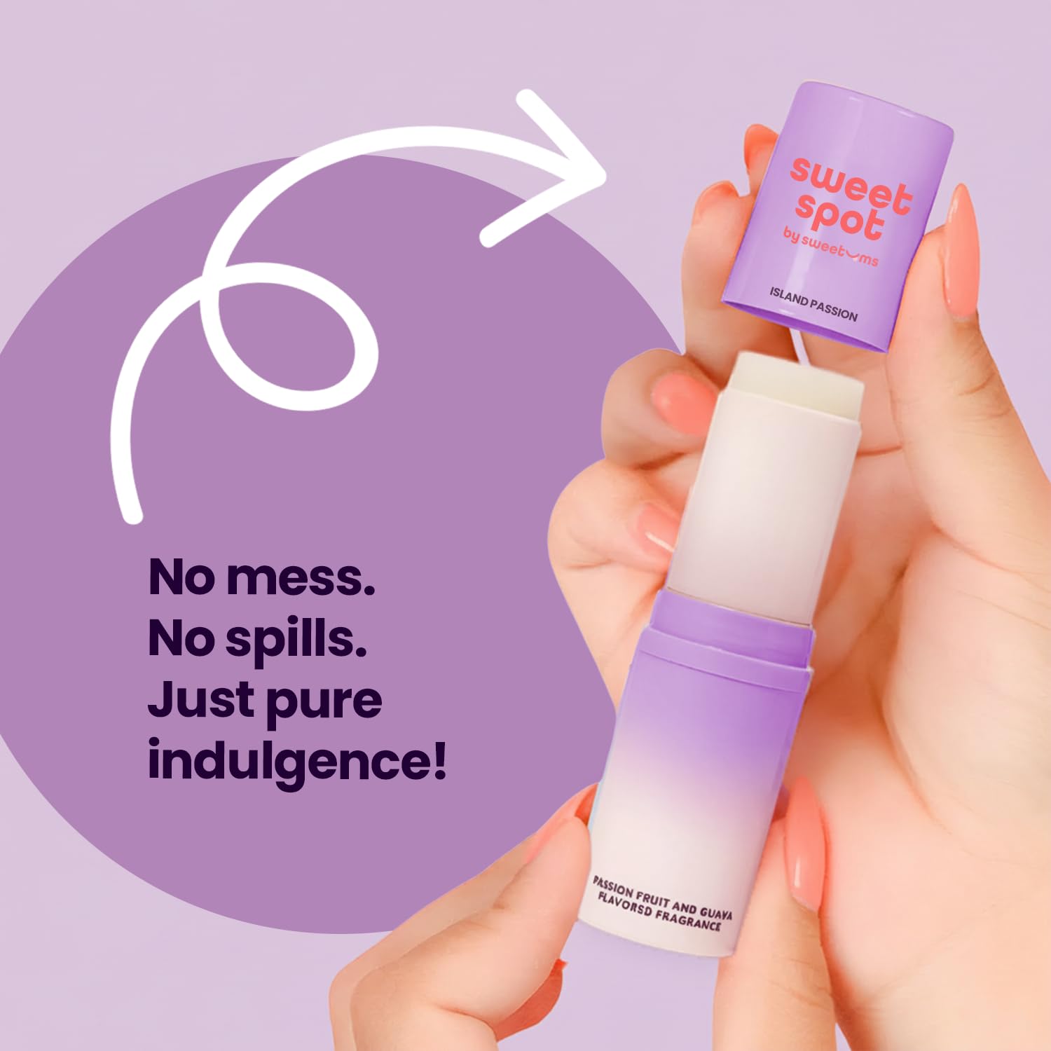 Sweetums SweetSpot next to hand for scale showing pocket-friendly portable perfume