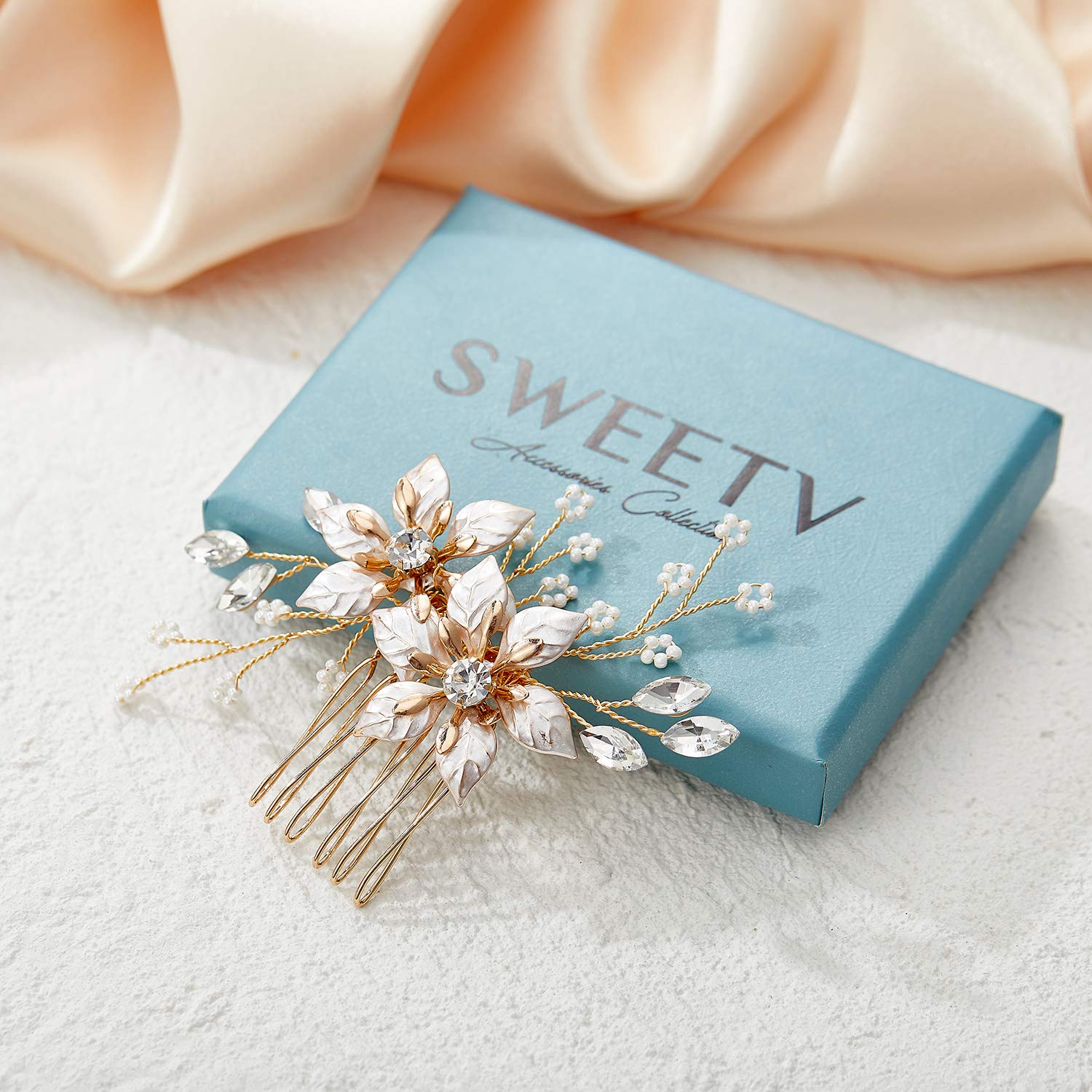 SWEETV comb placed in bridal updo adding refined finishing touch
