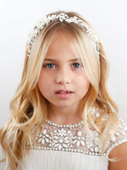 SWEETV close-up of tulle flowers and pearls, highlights delicate texture benefit