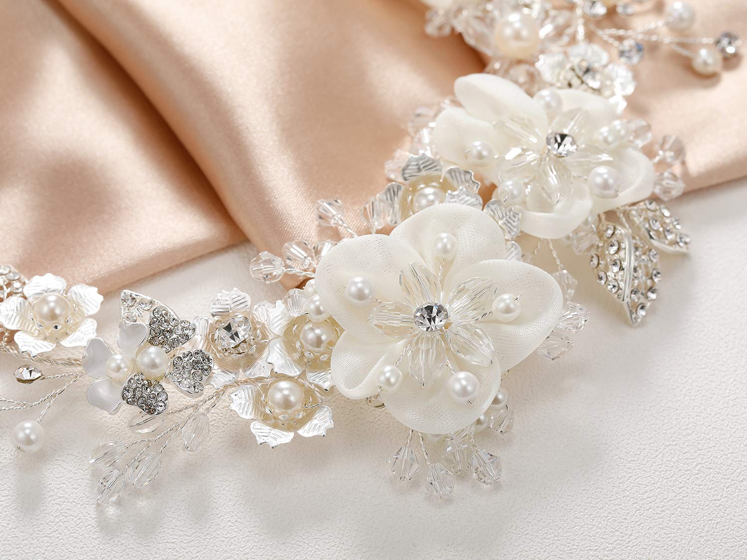 SWEETV headpiece in wedding portrait setting, suggests photogenic styling benefit