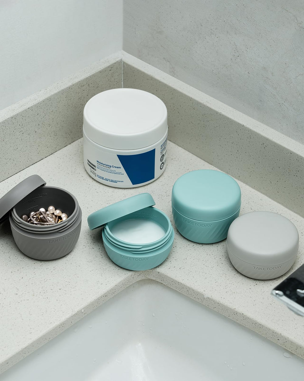 TakeToday containers with carry-on luggage at airport showing TSA-ready convenience