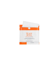 Hand applying Tan Towel towelette demonstrating quick clear application