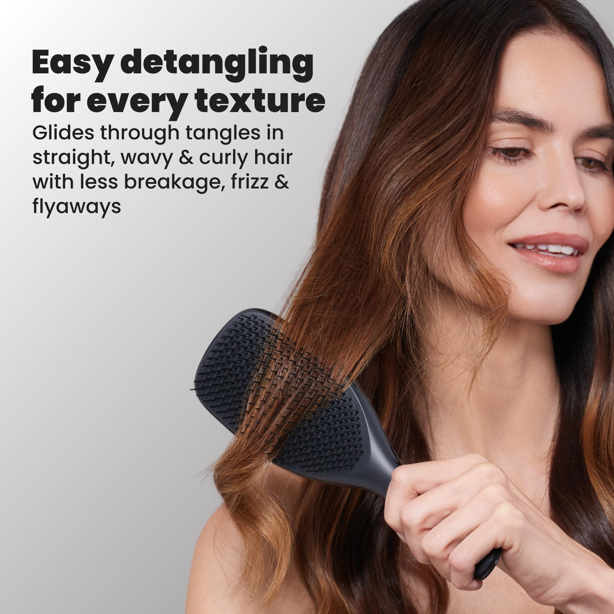 TANGLE TEEZER used on curly hair showing reduced frizz and smoother finish