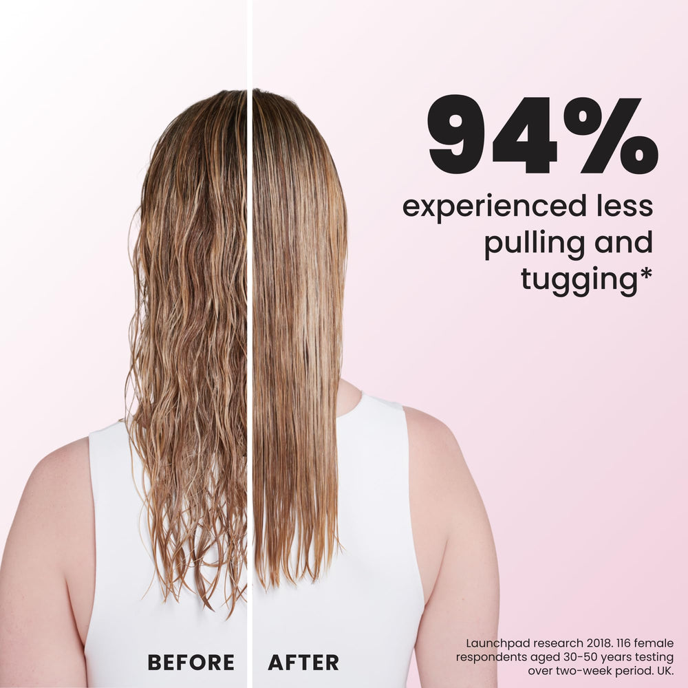 TANGLE TEEZER spreading conditioner evenly through hair for uniform product distribution