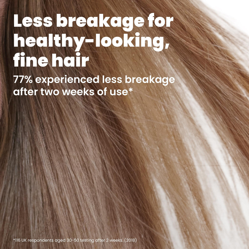 TANGLE TEEZER teeth bending around a knot to show flexibility and reduced breakage