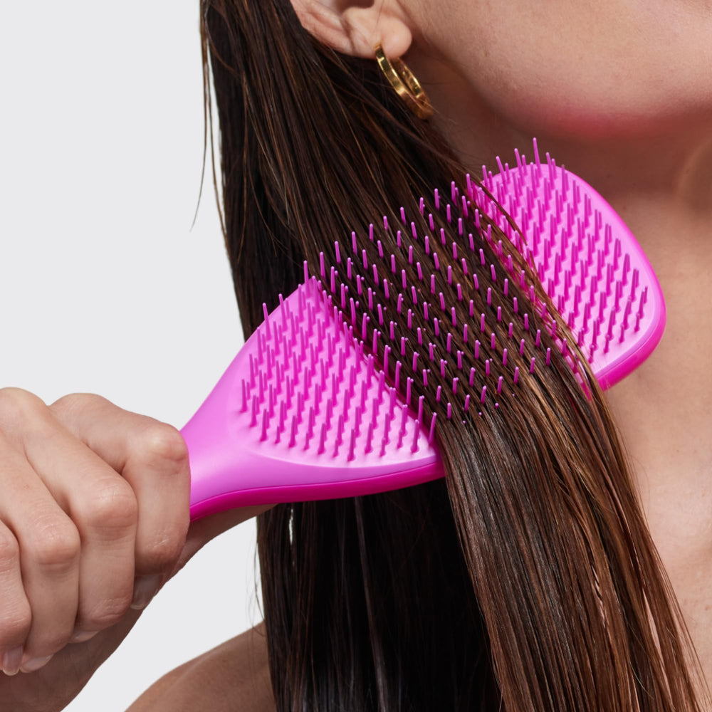 TANGLE TEEZER lifestyle bathroom display highlighting quick daily routine benefit