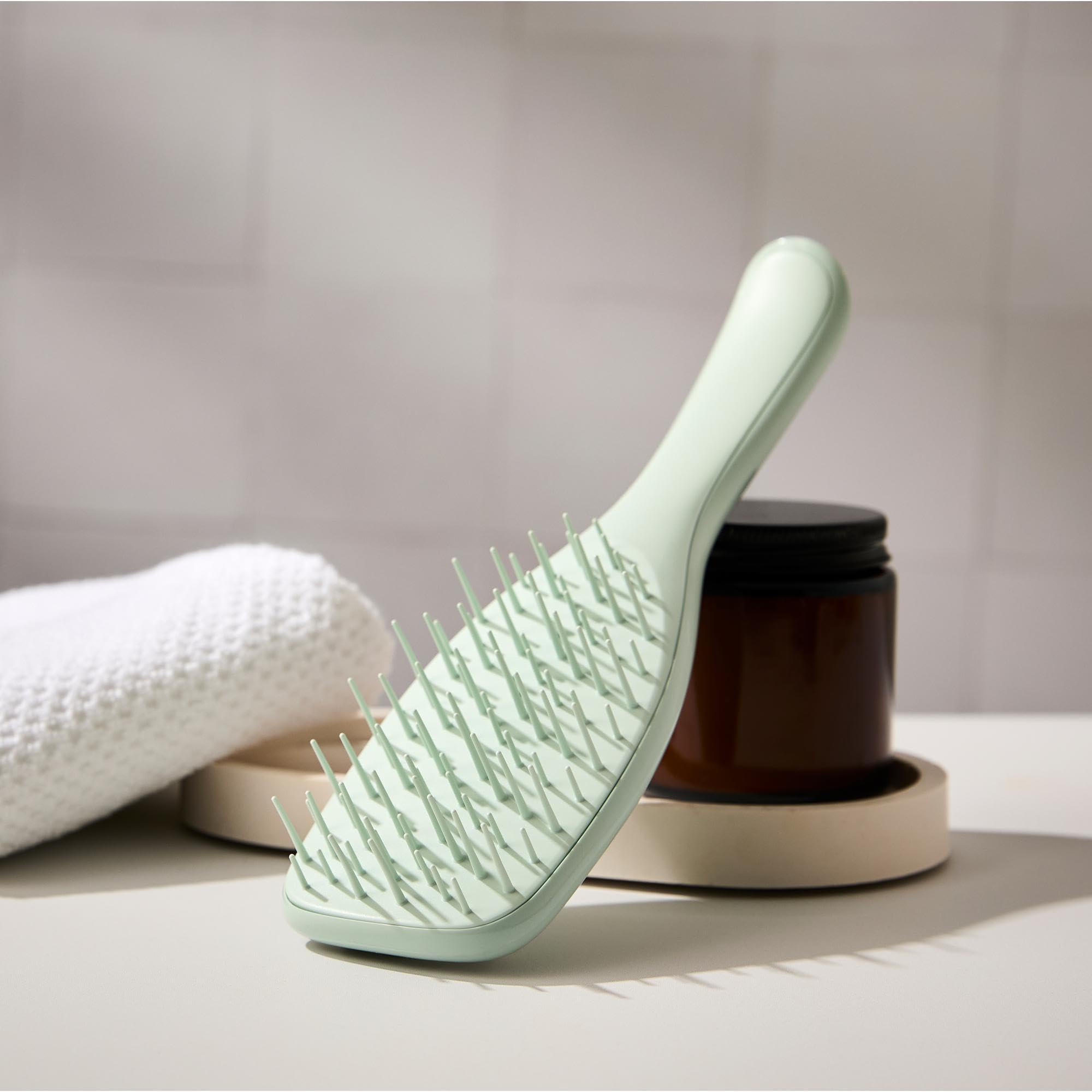 TANGLE TEEZER on bathroom shelf in lifestyle scene showing daily routine fit