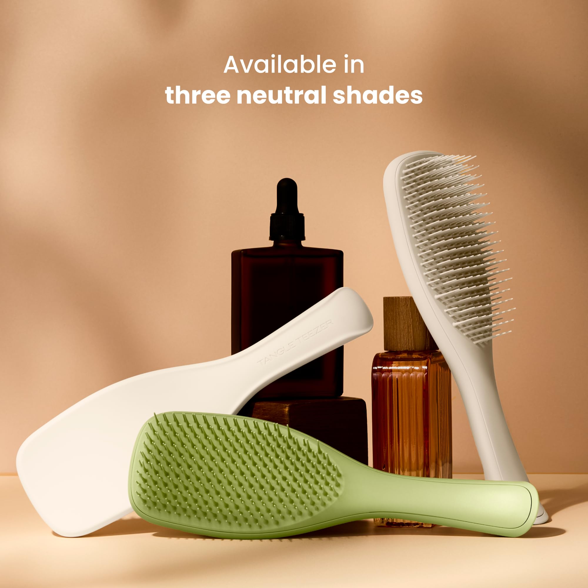 TANGLE TEEZER brushing curly hair showing reduced tugging and preserved curl definition benefit