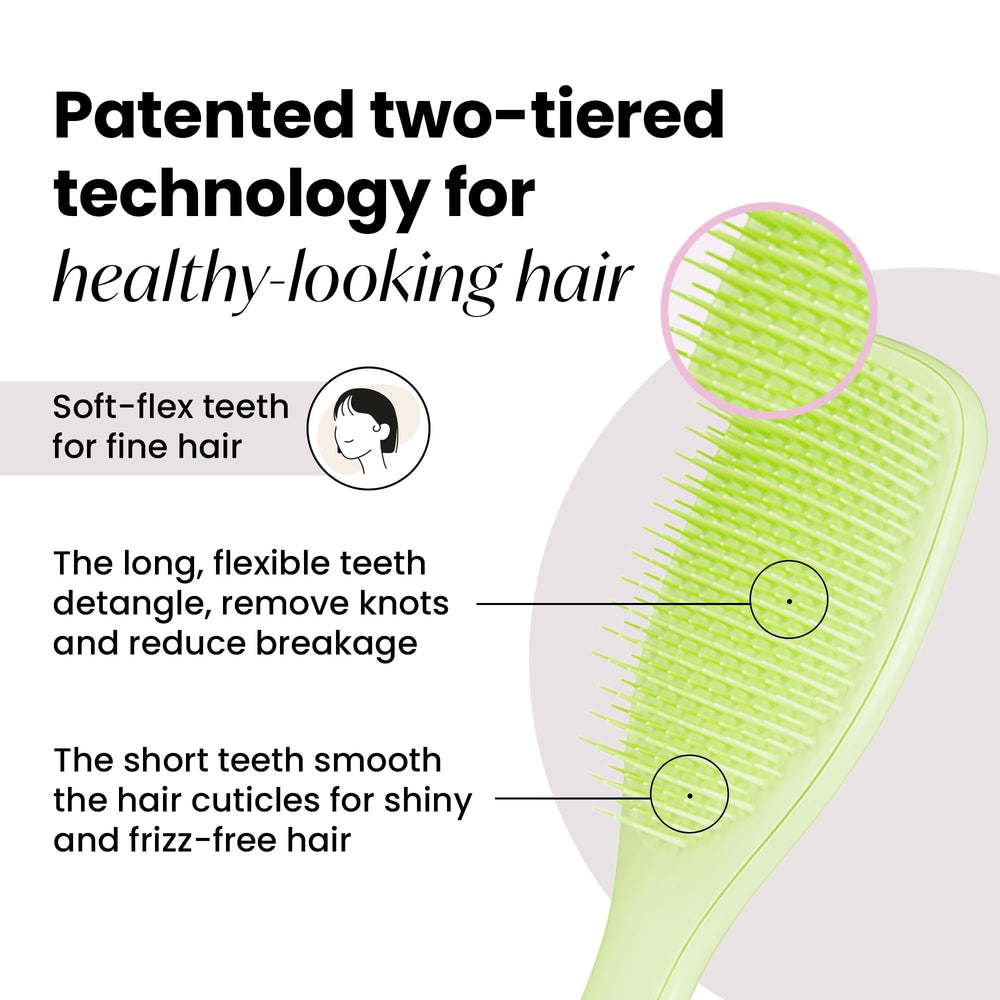 TANGLE TEEZER angled grip demonstrating ergonomic hold for comfortable brushing