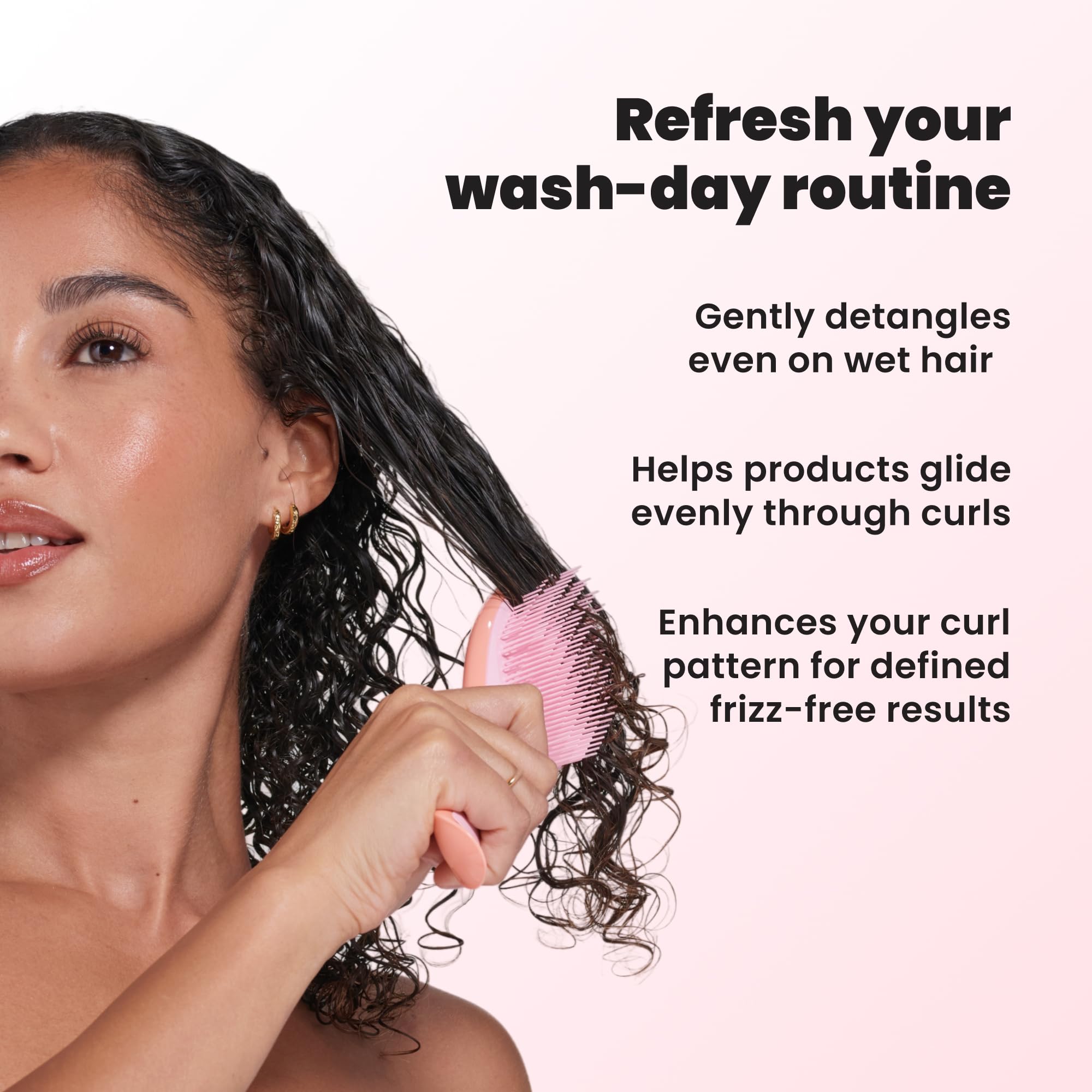TANGLE TEEZER spreading leave-in cream evenly through coils