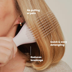 TANGLE TEEZER brushing wet hair to detangle with less pulling and even product spread