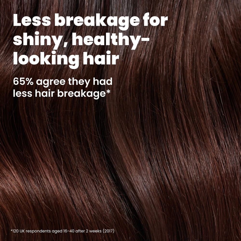 TANGLE TEEZER brushing damp hair in shower showing gentle detangling benefit