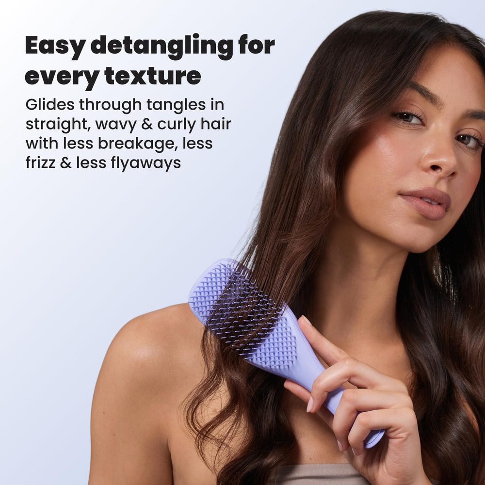 TANGLE TEEZER spreading conditioner through strands for even product distribution