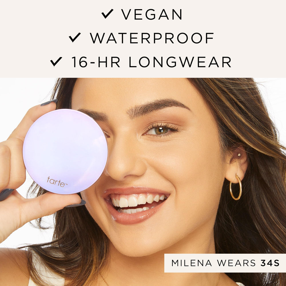 tarte powder compact held in hand showing compact scale and portability