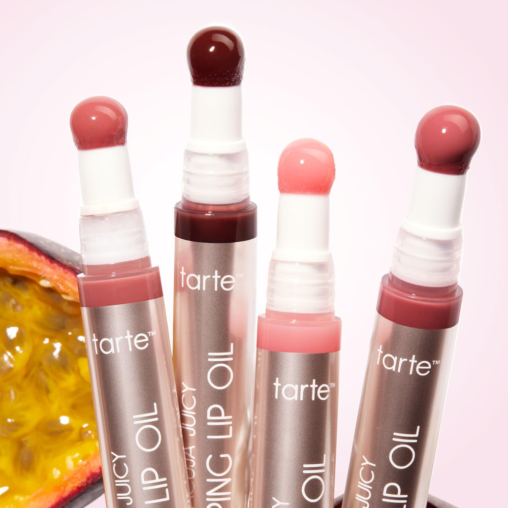 tarte layered over lipstick showing enhanced shine and dimension