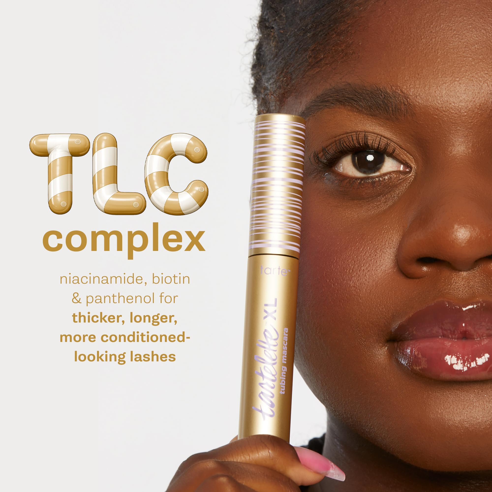 tarte travel-size in hand for portability and on-the-go convenience