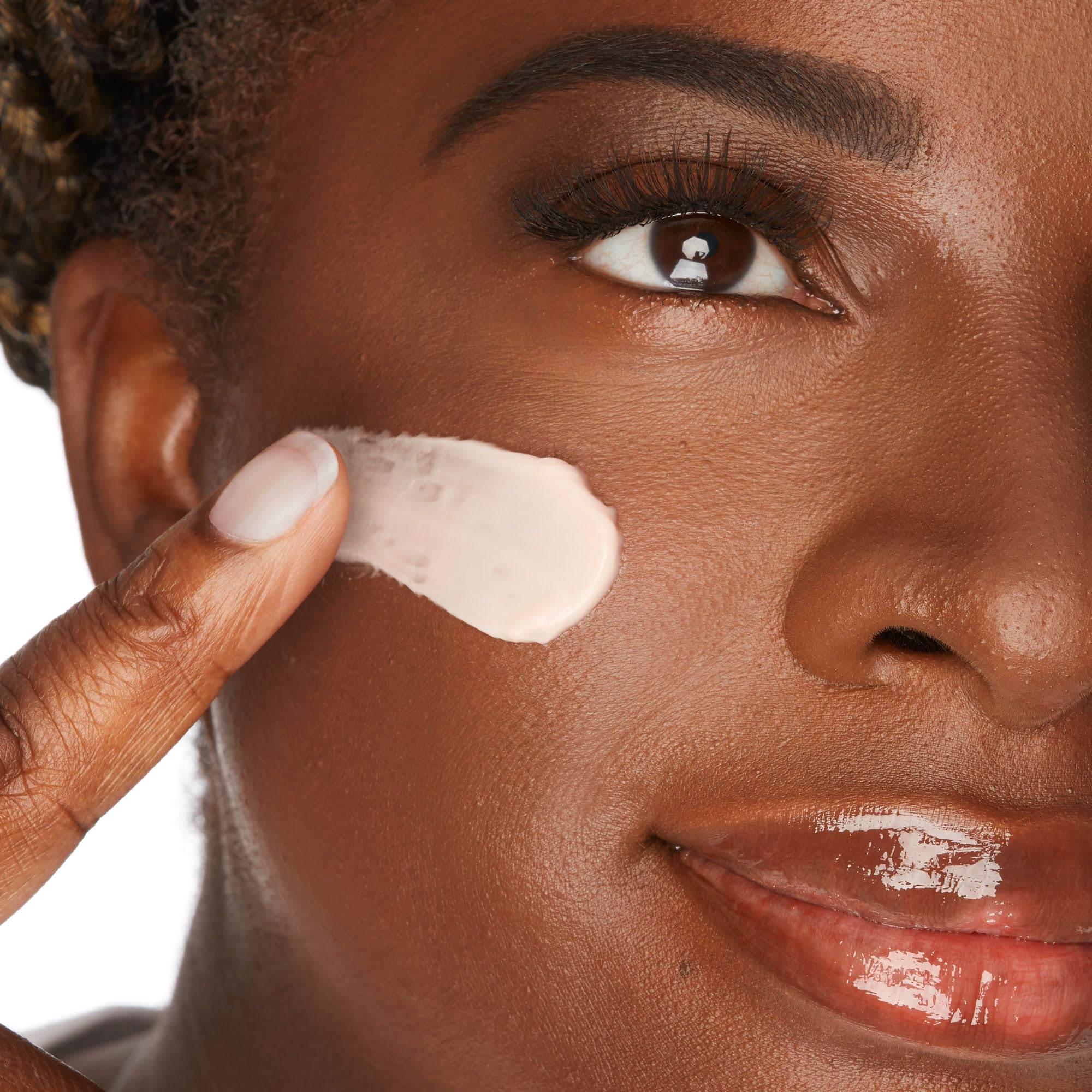 tarte primer on fingers being dispensed, showing easy spreadability and hydration