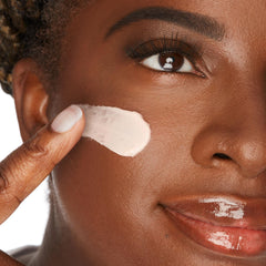tarte primer on fingers being dispensed, showing easy spreadability and hydration