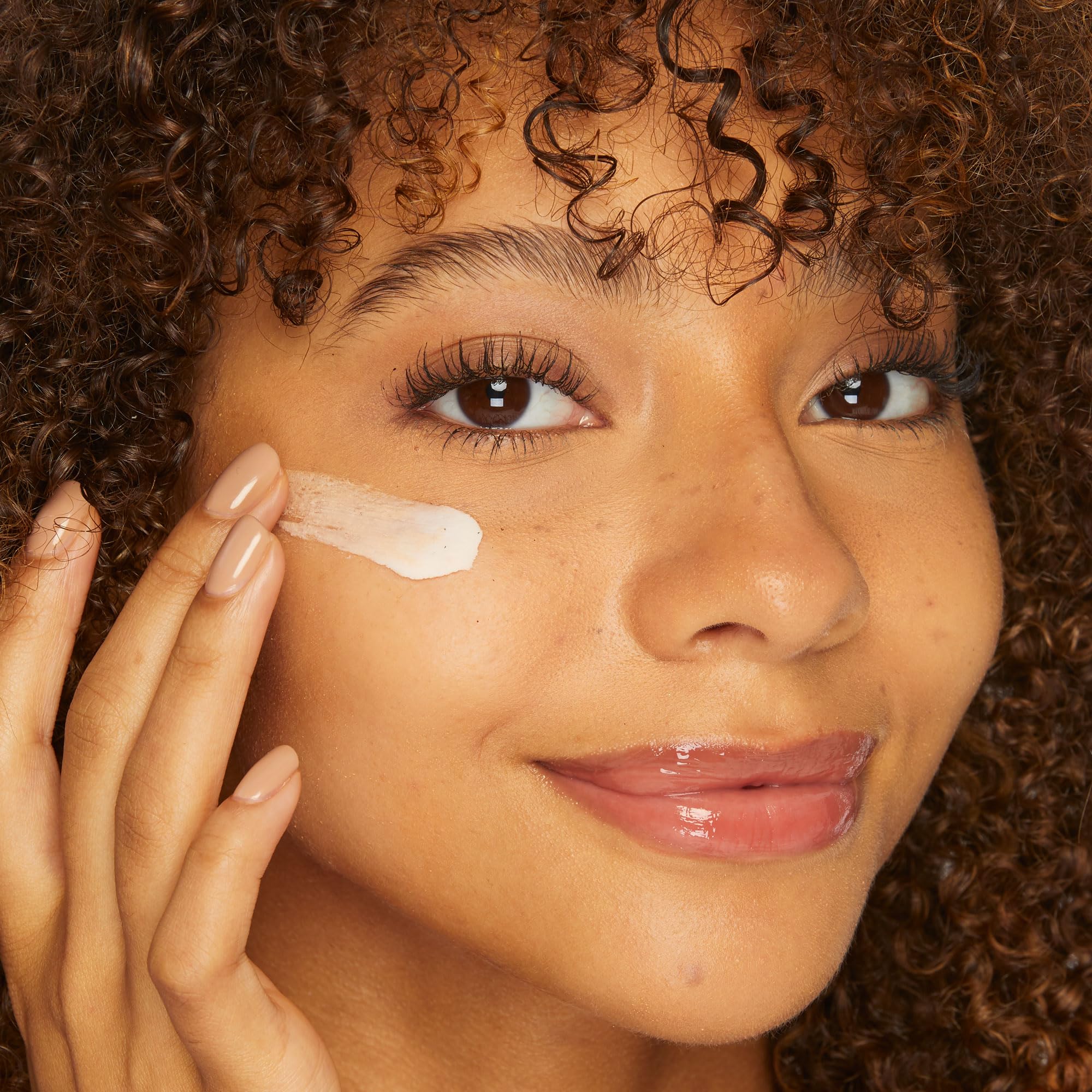 tarte primer on vanity with makeup tools, showcasing a polished routine benefit