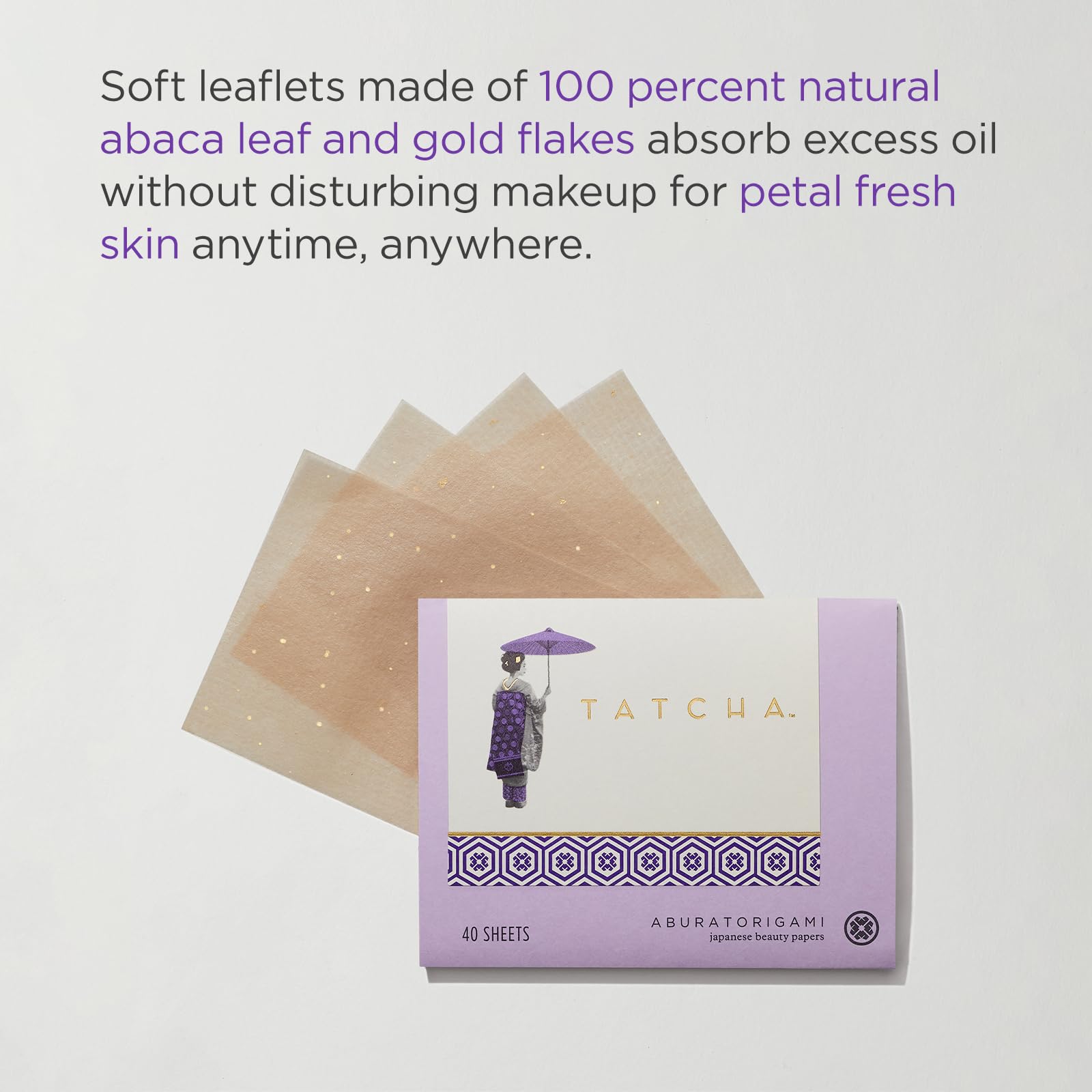TATCHA single abaca sheet close-up with gold flecks highlighting delicate texture and absorbency