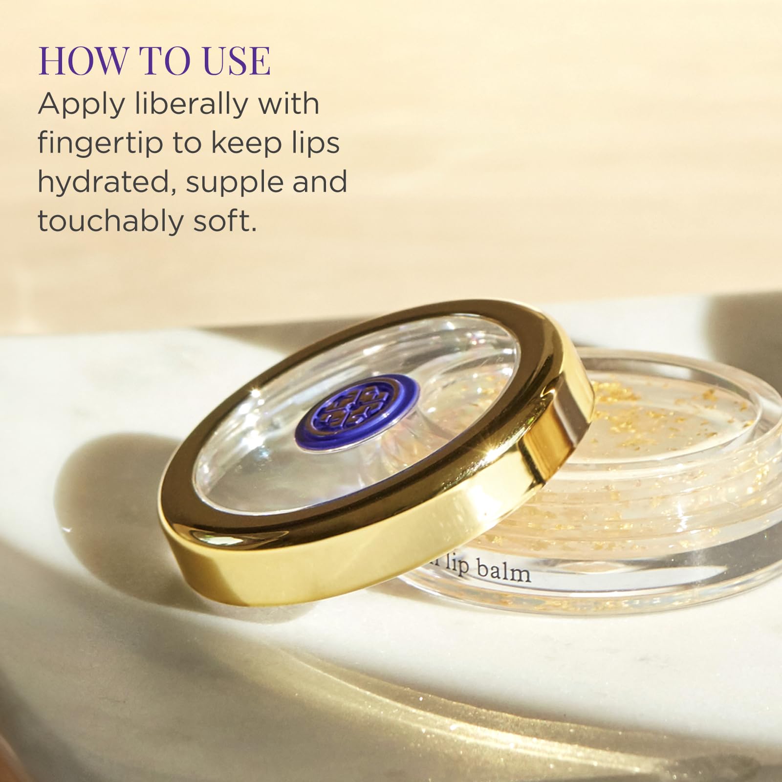 TATCHA balm next to a coin for scale, compact size and travel-friendly convenience