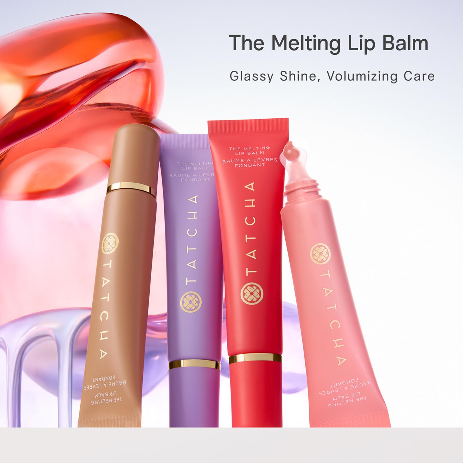 TATCHA glossy finish reflecting light to show hydrated, luminous lips